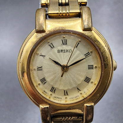 Seiko Watch Women 24mm Champagne Dial Gold Tone Round V7011781 New Battery VTG1