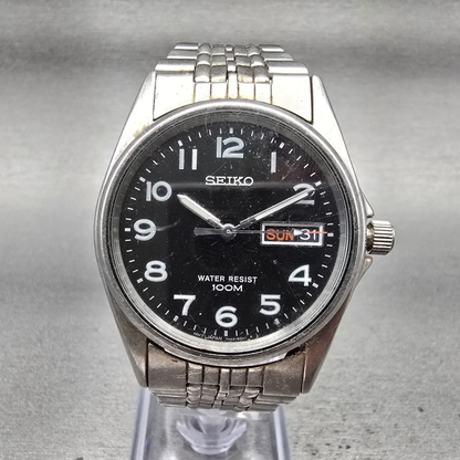 Seiko Watch Men 35mm Black Dial Silver Tone Daydate Round 7N43-8329 New BatteryP0