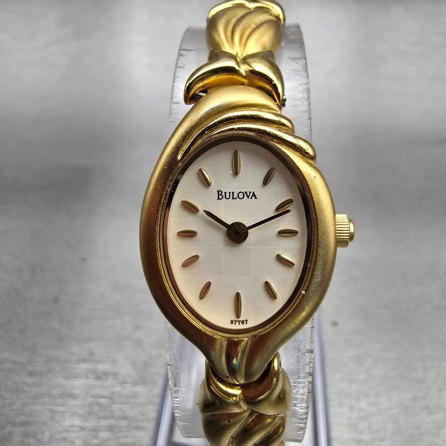Bulova Watch Women 17mm MOP Dial Gold Tone Oval 97T67 New Battery0