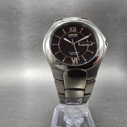Citizen Eco-Drive Watch Men 37mm Black Dial Titanium Daydate E101-K18434 Runs5