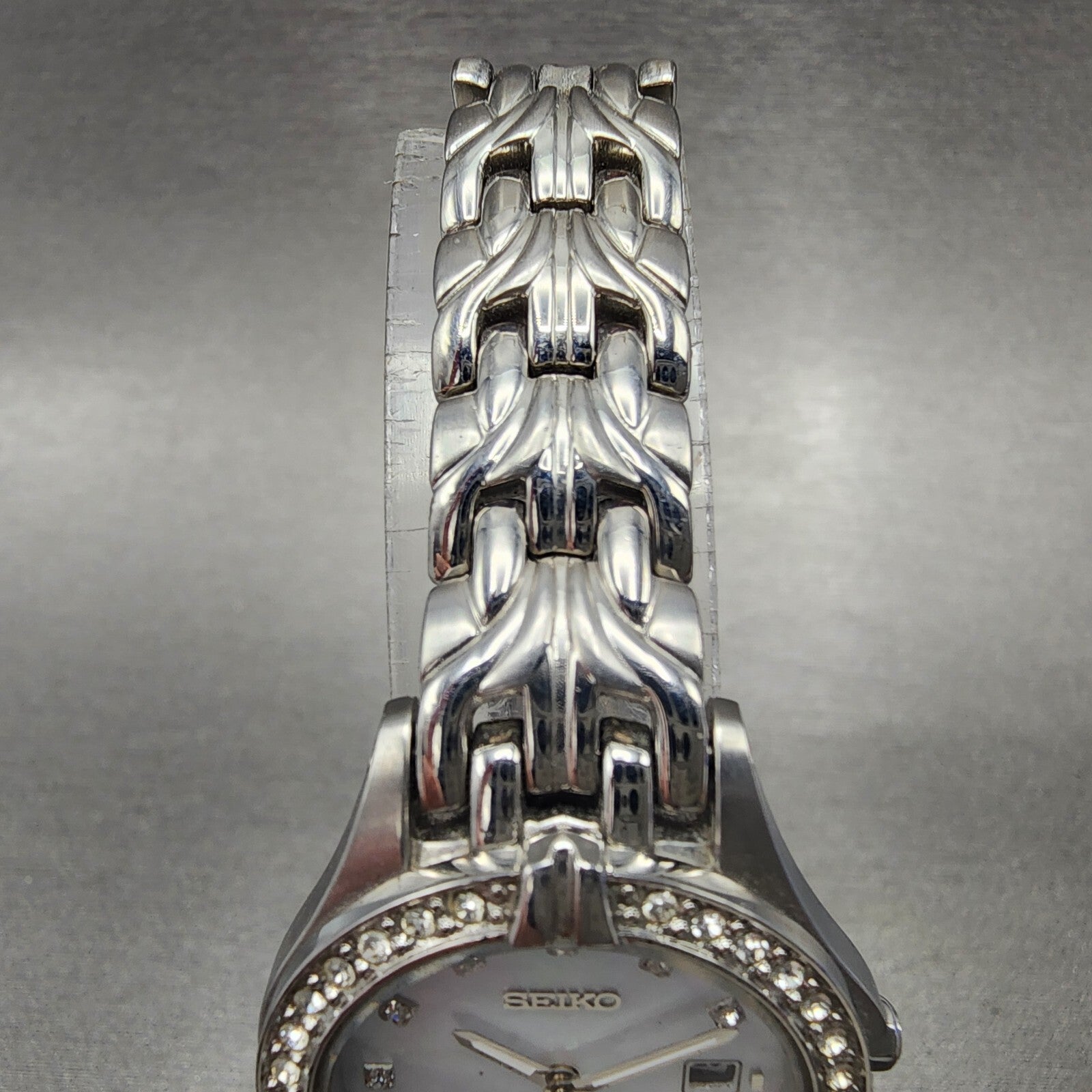 Seiko Solar Watch Women 27mm MOP Dial Steel Date Round Crystal Bezel Runs4