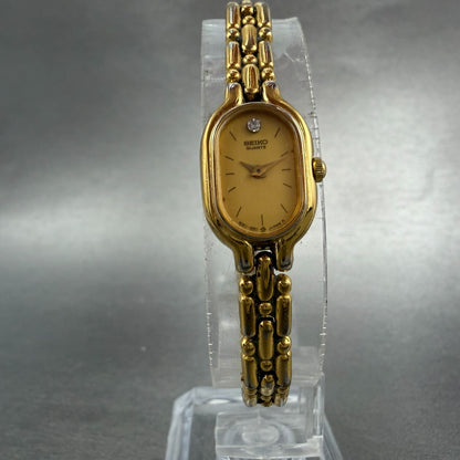 Seiko Watch Women 13mm Champagne Dial Gold Tone Oval 1e20-6039 New Battery VTG5