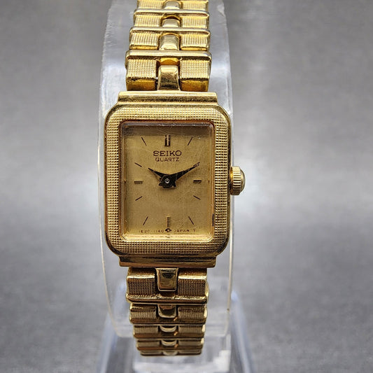 Seiko Tank Watch Women 13mm Gold Dial Gold Tone Rectangle 1e205689 New Battery0