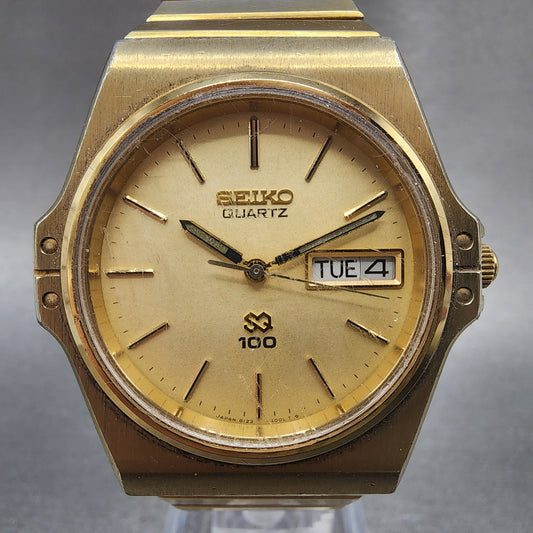 Seiko SQ 100 Watch Men 35mm Champagne Dial Gold Tone 81236000 NewBat READ!!!!!!0