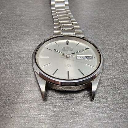 Seiko SQ Watch Men 34mm Silver Dial Silver Tone Daydate 81238009 PARTS3