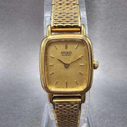 Seiko Watch Women 17mm Champagne Dial Gold Tone Rectangle 2y005b49 New Battery0