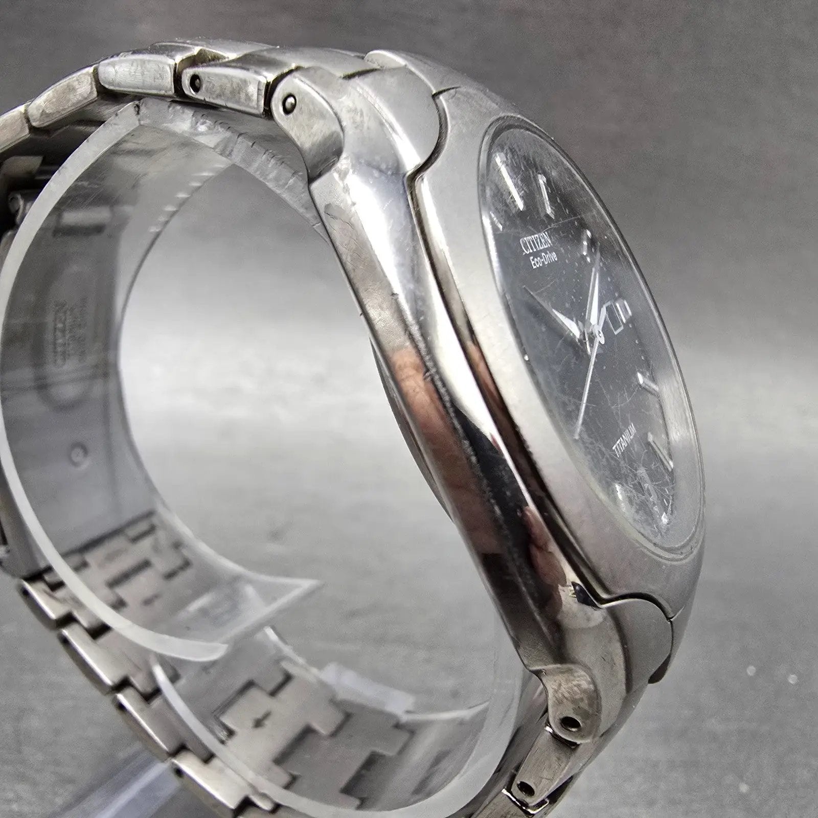 Citizen Eco-Drive Watch Men 38mm Black Dial Titanium Date E111-S049610 Runs EWR3