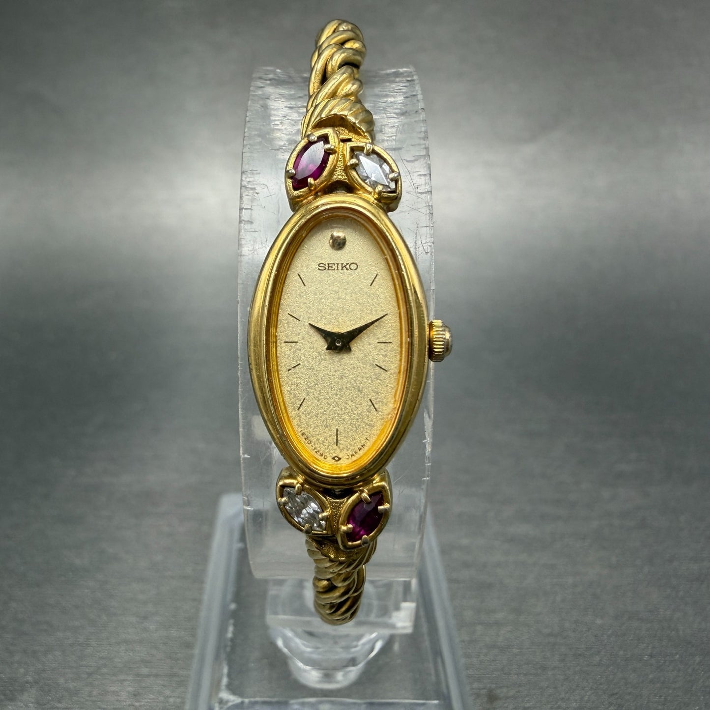Seiko Watch Women 13mm Champagne Dial Gold Tone Oval 1E20-5760 New Battery Gems0