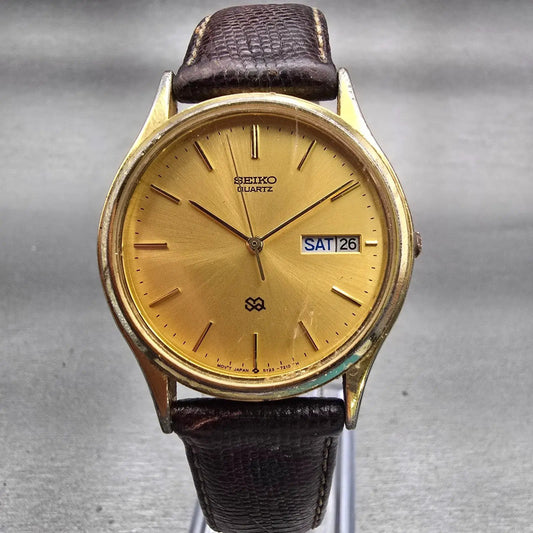 Seiko SQ Watch Men 34mm Gold Dial Gold Tone Daydate Round 5Y23-7079 New Battery0