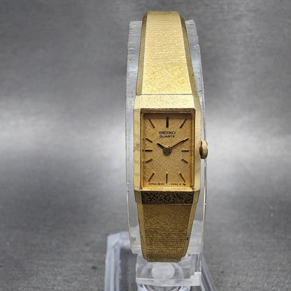 Seiko Tank Watch Women 12mm Champagne Dial Gold Tone 2e206259 New Battery0