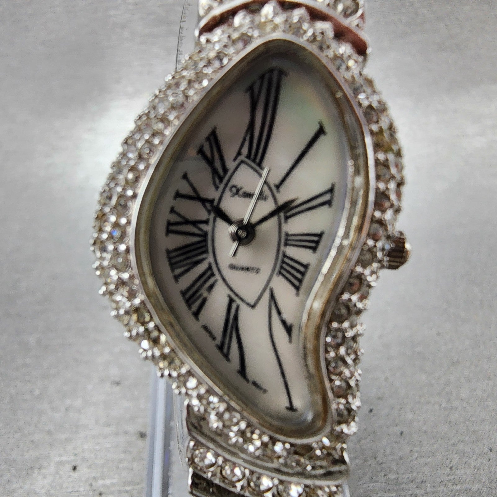 Xanadu Half Moon Watch Women 22mm MOP Dial Crystal Accents Silver Tone New Batt1