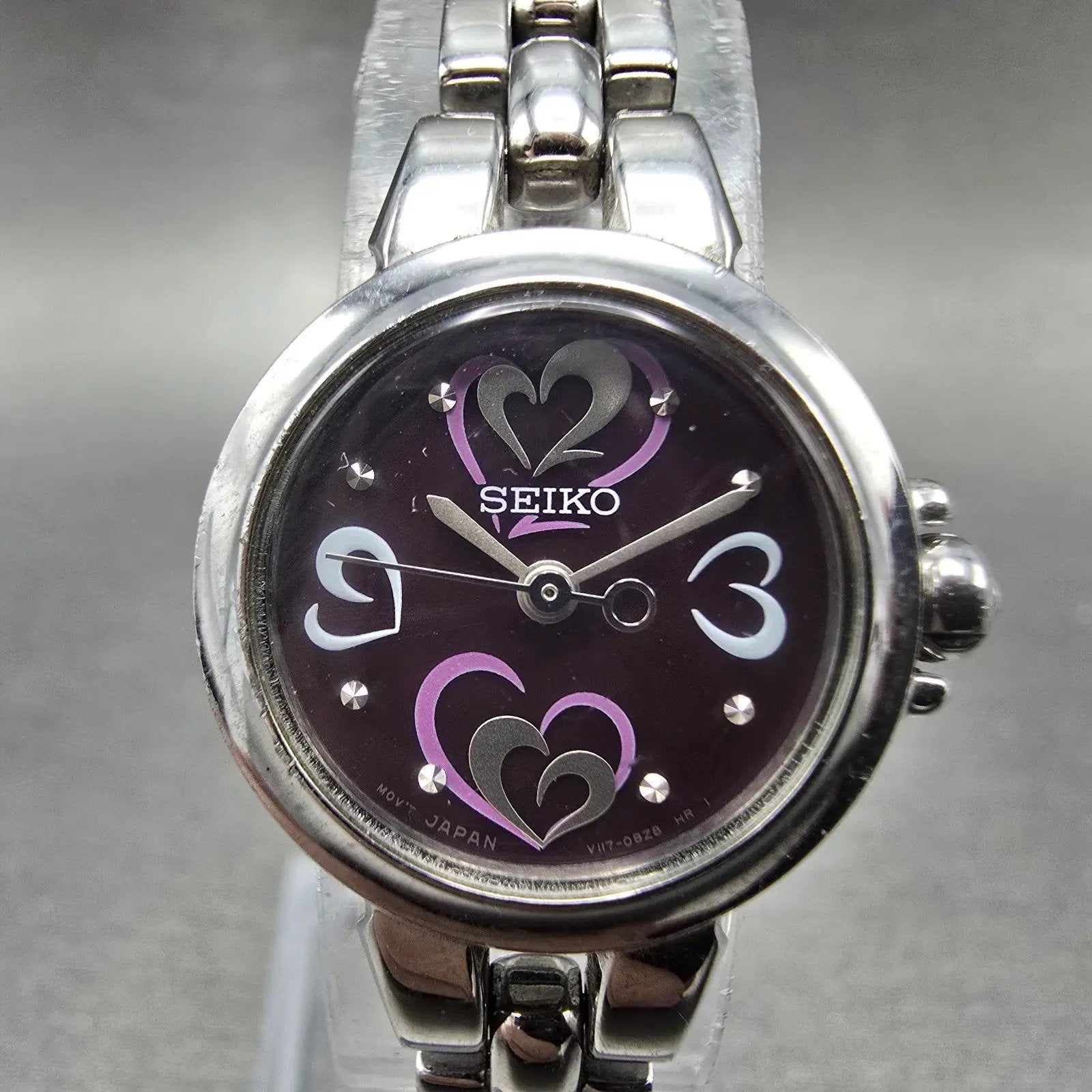 Seiko Solar Heart Watch Women 22mm Purple Dial Silver Tone Round V117-0BB0 Runs0