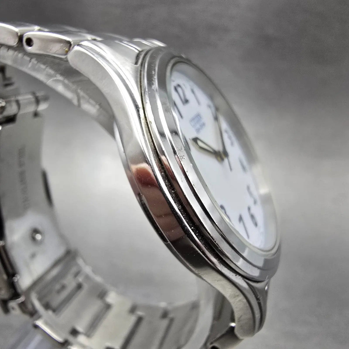 Citizen Eco-Drive Watch Men 36mm White Dial Silver Date E031-S048419 Round Runs4