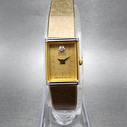 Seiko Tank Watch Women 12mm Champagne Dial Gold Tone 2e205409 New Battery0