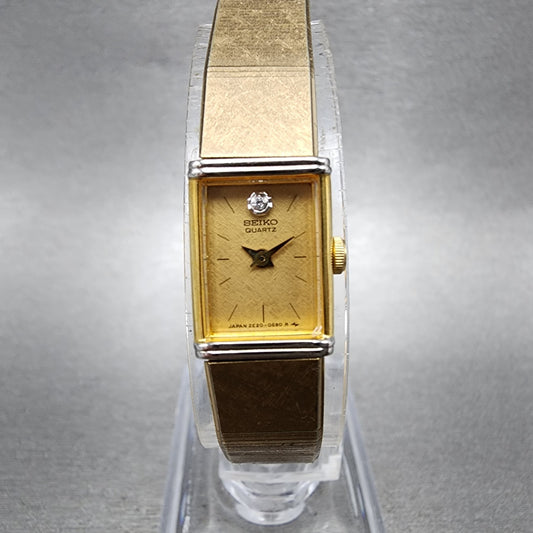 Seiko Tank Watch Women 12mm Champagne Dial Gold Tone 2e205409 New Battery0