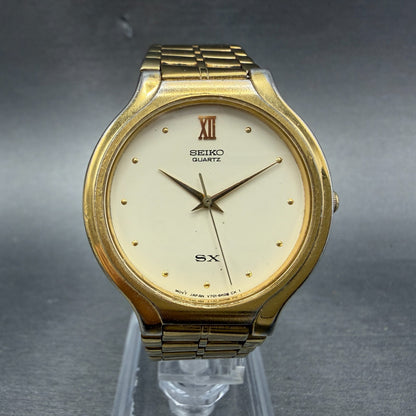 Seiko SX Watch Men 34mm Cream Dial Gold Tone Round Vinatge V701-6K00 New Battery0