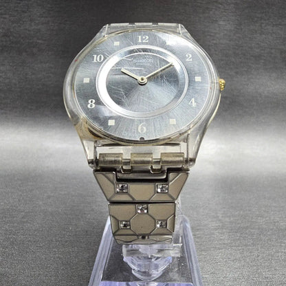Swatch Elegantly Framed Watch Women 34mm Silver Dial Clear Case SFK356G New Batt5