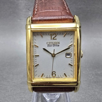 Citizen Eco-Drive Tank Watch Men 25mm White Dial Gold Date E010-S001579 Works HG0