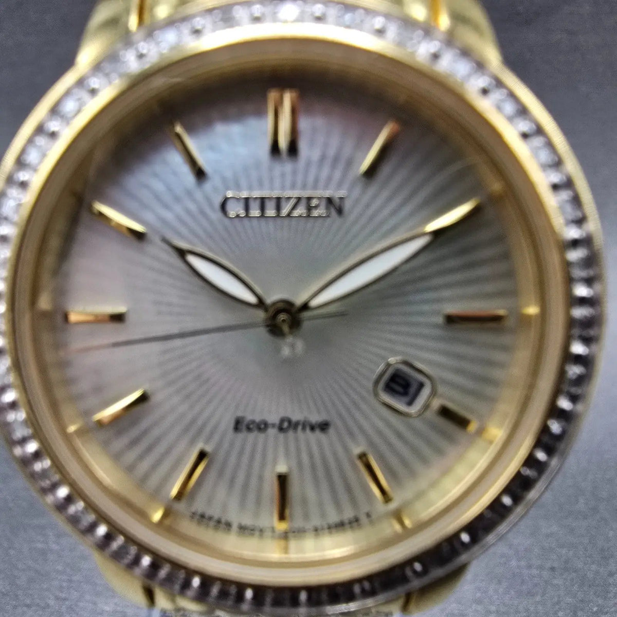 Citizen Eco-Drive Watch Women 30mm MOP Dial Gold Date Diamonds EW2282-52D Runs1
