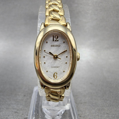 Seiko Lucent Watch Women 17mm Silver Dial Gold Tone Oval 1F215C80 New Battery0