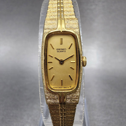 Seiko Tank Watch Women 13mm Gold Dial Gold Tone Rectangle 2E206259 New Battery0