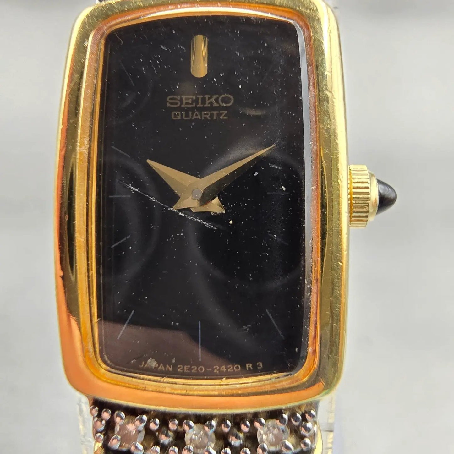 Seiko Watch Women 13mm Black Dial Gold Tone Gemmed Rectangle 2E20-6929 New Batt1