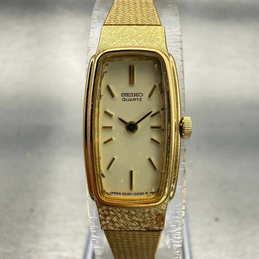 Seiko Watch Women 13mm Champagne Dial Gold Tone Rectangle 2E20-5019 New Battery0
