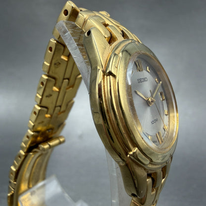 Seiko Watch Women 26mm Silver Dial Gold Tone Date Round 7N82-0AM0 New Battery3