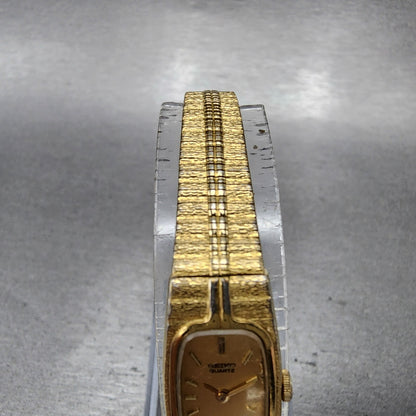 Seiko Tank Watch Women 13mm Gold Dial Gold Tone Rectangle 2E206310 New BatteryA4