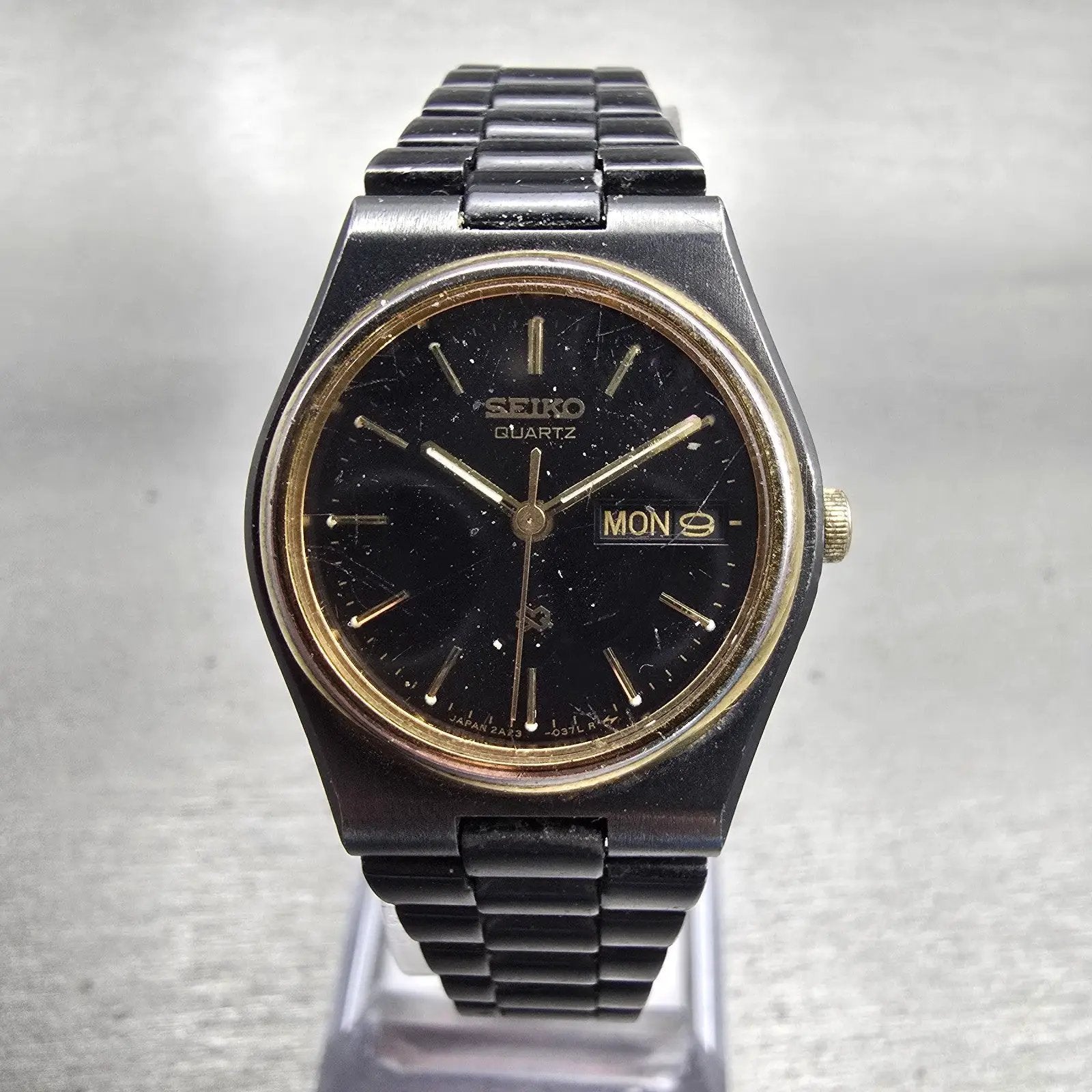 Seiko SQ Watch Women 24mm Black Dial Black & Gold Tone Daydate 2A23-0159 New Bat0