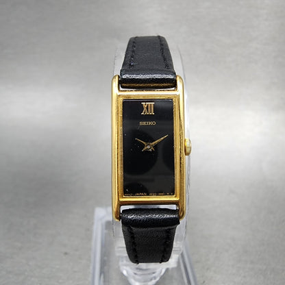 Seiko Tank Watch Women 13mm Black Dial Gold Tone Rectangle 2e206129 New Battery0