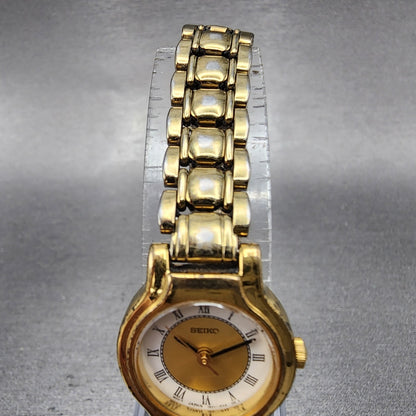 Seiko Watch Women 20mm White & Gold Dial Gold Tone Round 1N01 New Battery