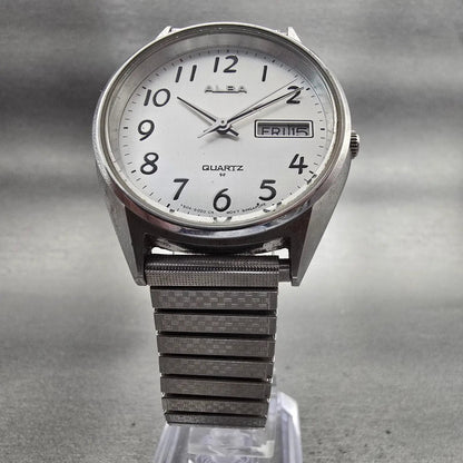 Seiko Alba Watch Men 35mm Silver Dial Silver Tone Daydate Y504-8010 New Battery5