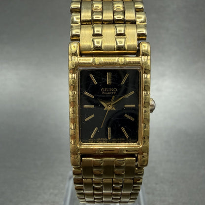 Seiko Tank Watch Women 16mm Black Dial Gold Tone Rectangle 1N015A69 New Battery0