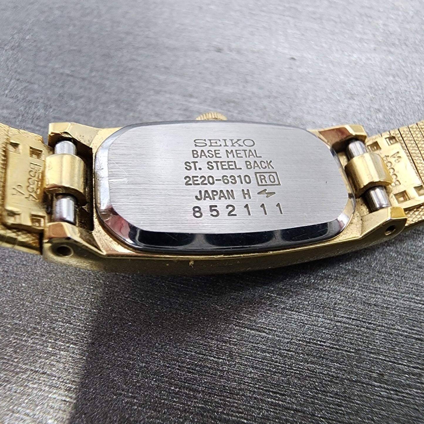 Seiko Tank Watch Women 13mm Gold Dial Gold Tone Rectangle 2E206310 New BatteryA9
