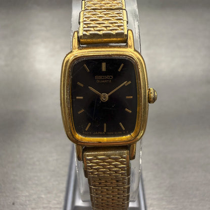 Seiko Watch Women 17mm Black Dial Gold Tone Rectangle 1N00-5K29 VTG New Battery0