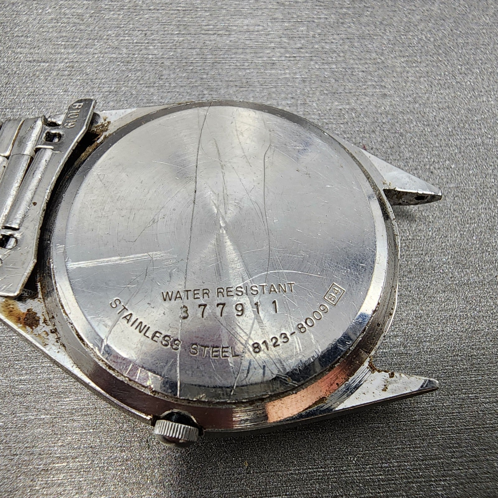 Seiko SQ Watch Men 34mm Silver Dial Silver Tone Daydate 81238009 PARTS10