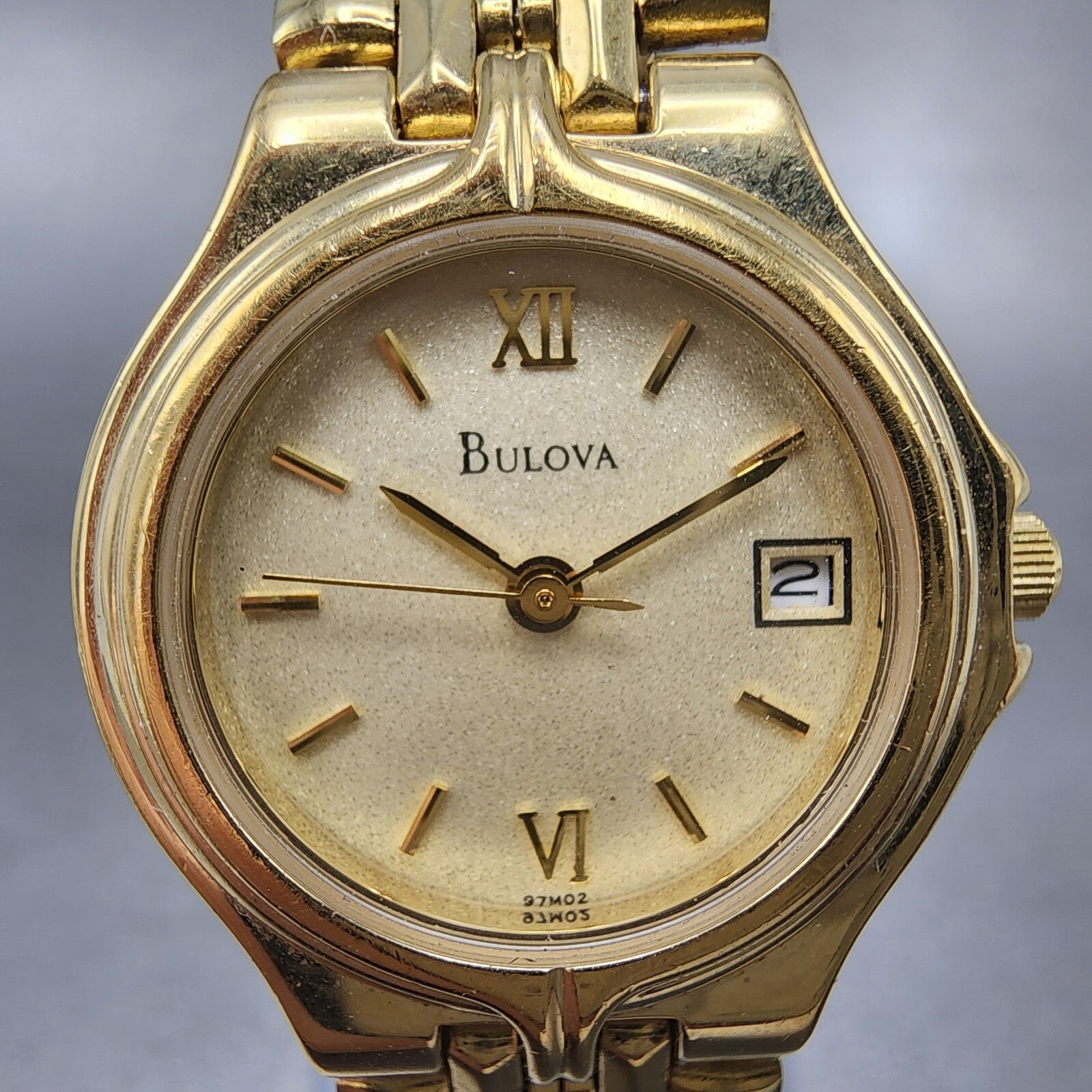 Bulova Watch Women 24mm Champagne Dial Gold Tone Date 97M02 New Battery1