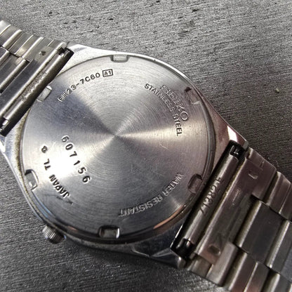 Seiko SQ Watch Men 34mm Silver Dial Silver Tone Daydate Round 5H23-7C60 New Batt10