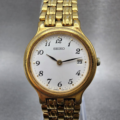 Seiko Watch Women 25mm White Dial Gold Tone Date Round 7n896001 New Battery0