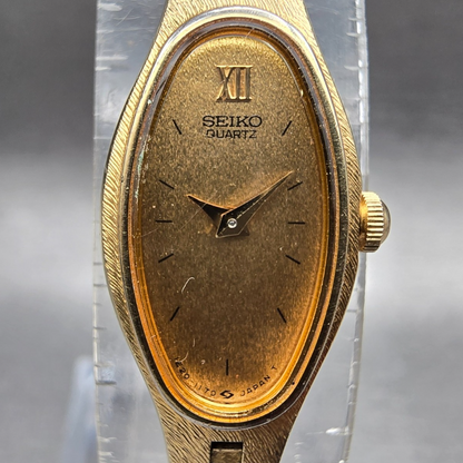 Seiko Watch Women 13mm Gold Dial Gold Tone Oval 1E20-5700 New Battery Vintage1