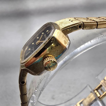 Bulova Watch Women 16mm Black Dial Gold Tone Oval 6971 New Battery Vintage2