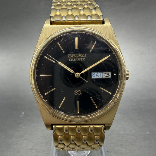 Seiko SQ Watch Men 33mm Black Dial Gold Tone Round Daydate VTG 6923-7039 PARTS0