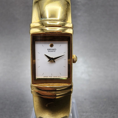 Seiko Watch Women 15mm White Dial Gold Tone Rectangle 1F205K19 New Battery0