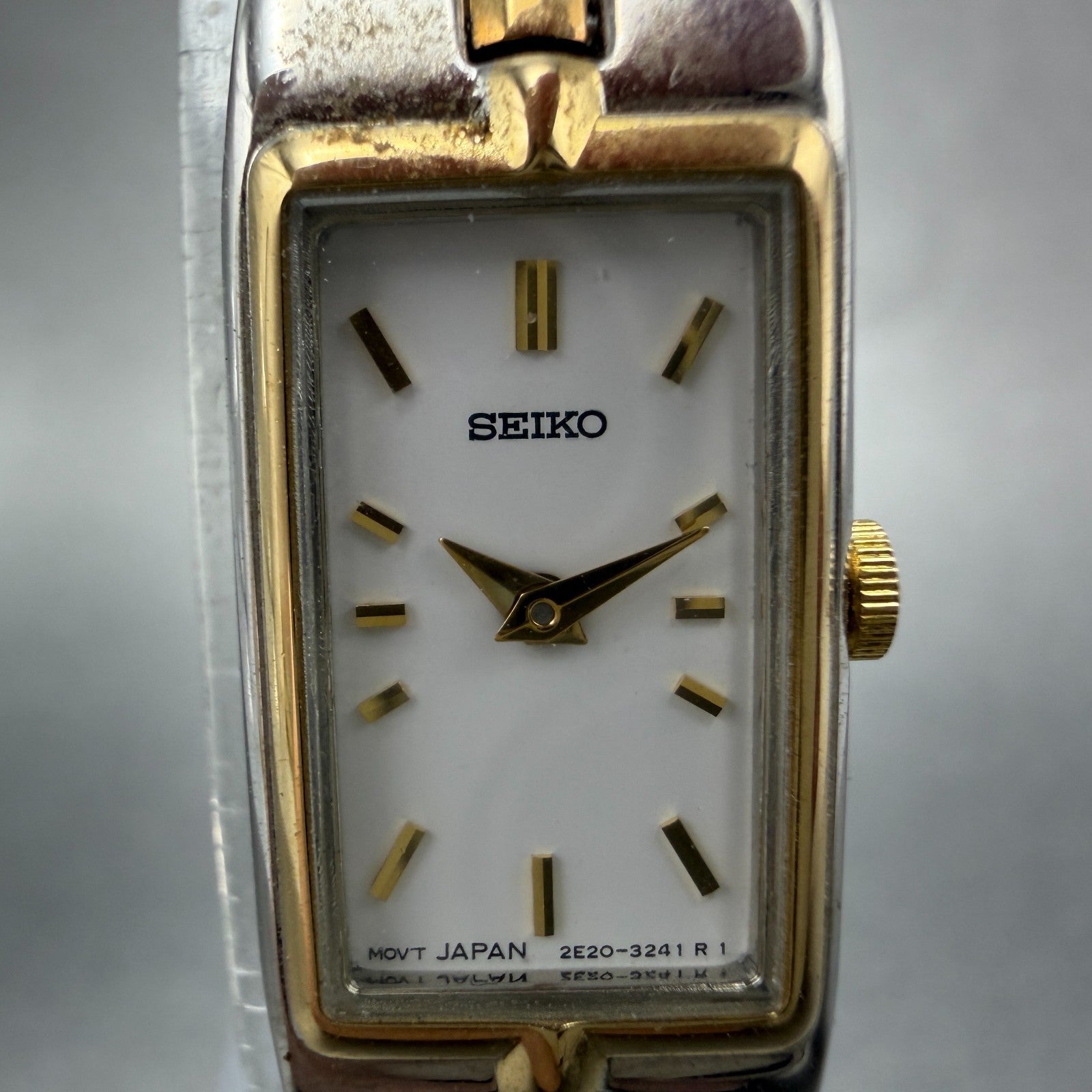 Seiko Watch Women 13mm White Dial Two Tone Rectangle 2E20-7479 New Batt NBT841