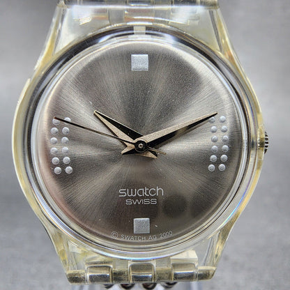 Swatch Silver Fall Watch Women 25mm Silver Dial Clear Case Round LW130 New Batt1