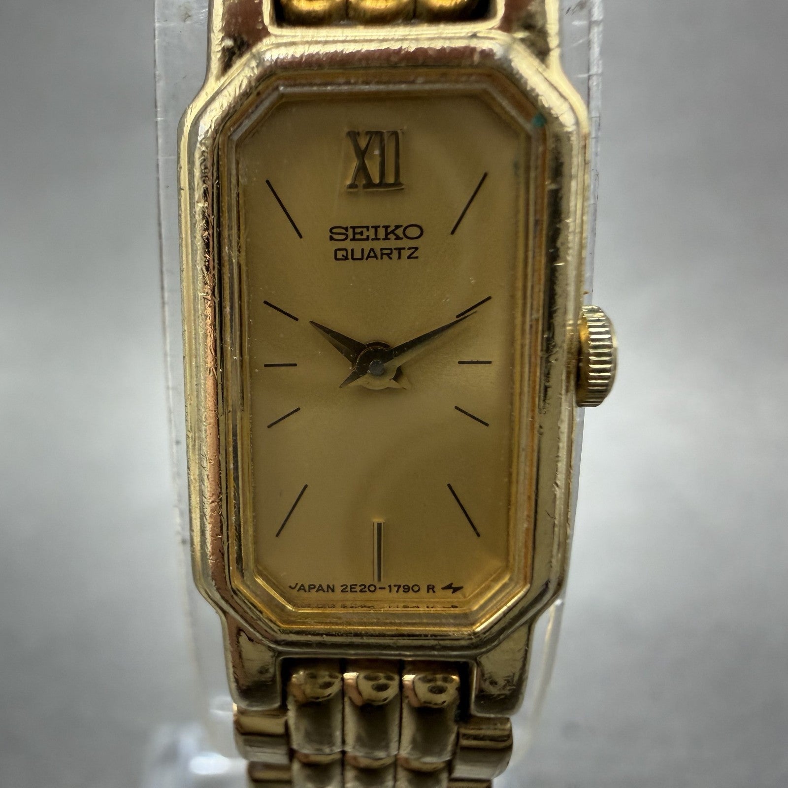 Seiko tank Watch Women 12mm Champagne Dial Gold Tone 2e206389 New Battery1