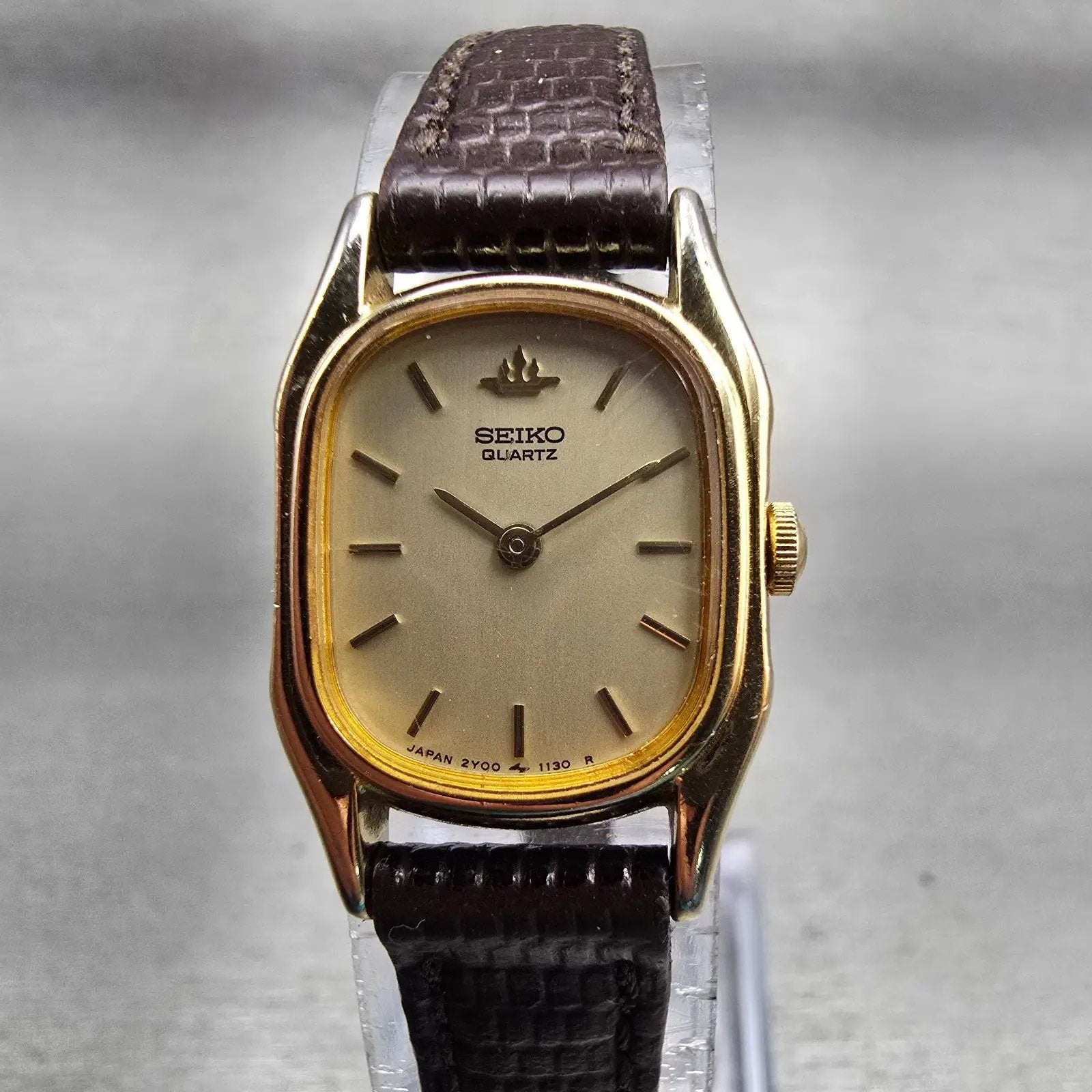 Seiko Watch Women 17mm Champagne Dial Gold Tone Rectangle 2Y00-5250 New Battery0