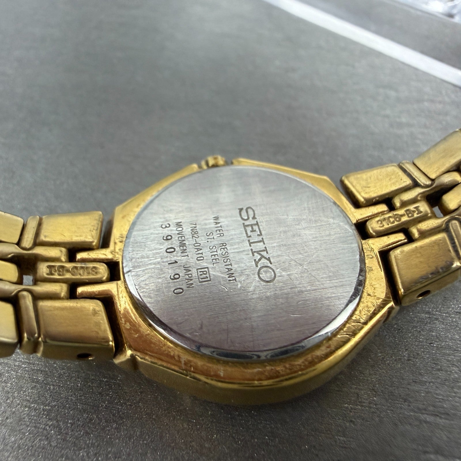 Seiko Watch Women 26mm Champagne Dial Gold Tone Date Round 7n82-0at0 New Battery9
