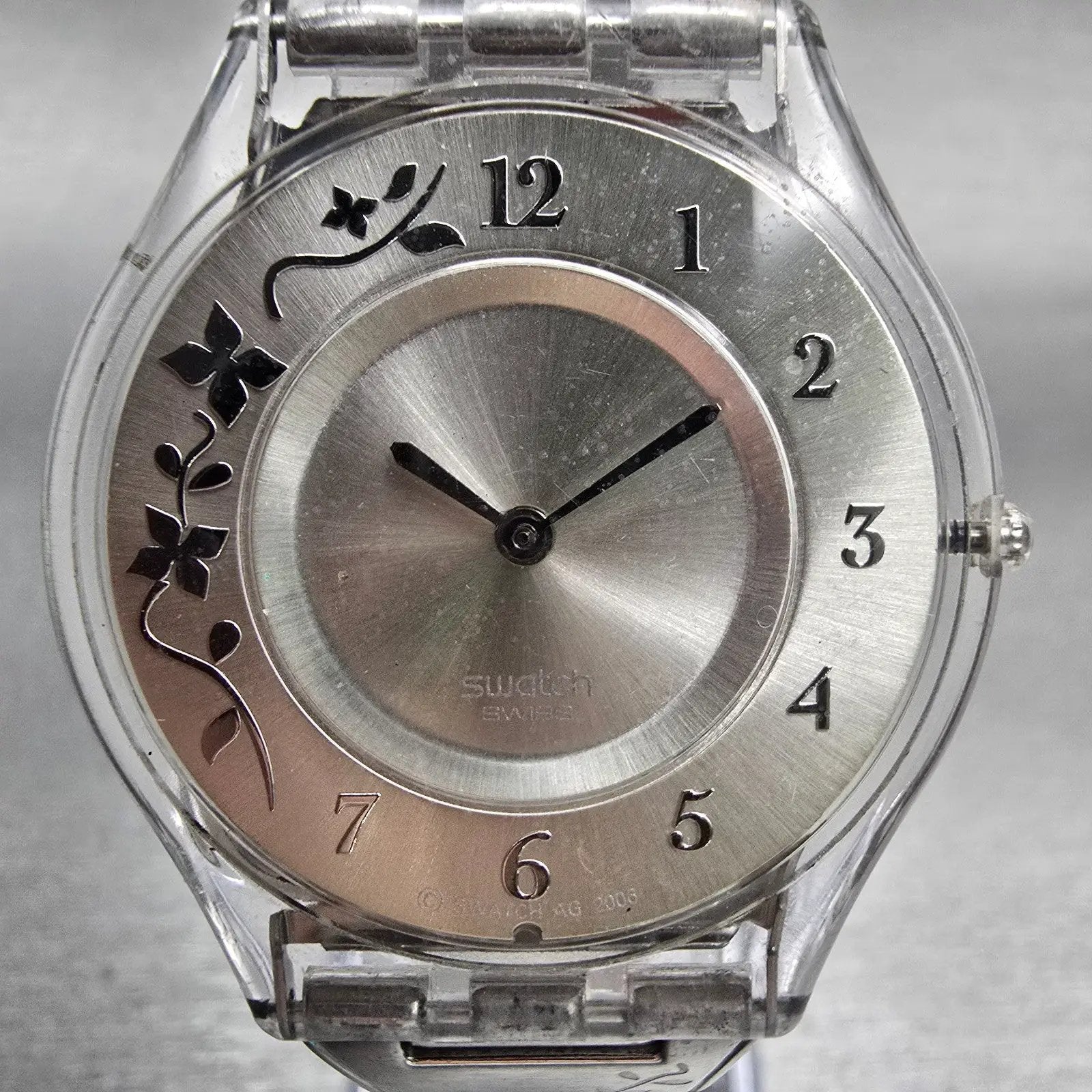 Swatch Skin CLIMBER FLOWERY Watch Women Silver Dial Clear Case SFK300G New Batt1